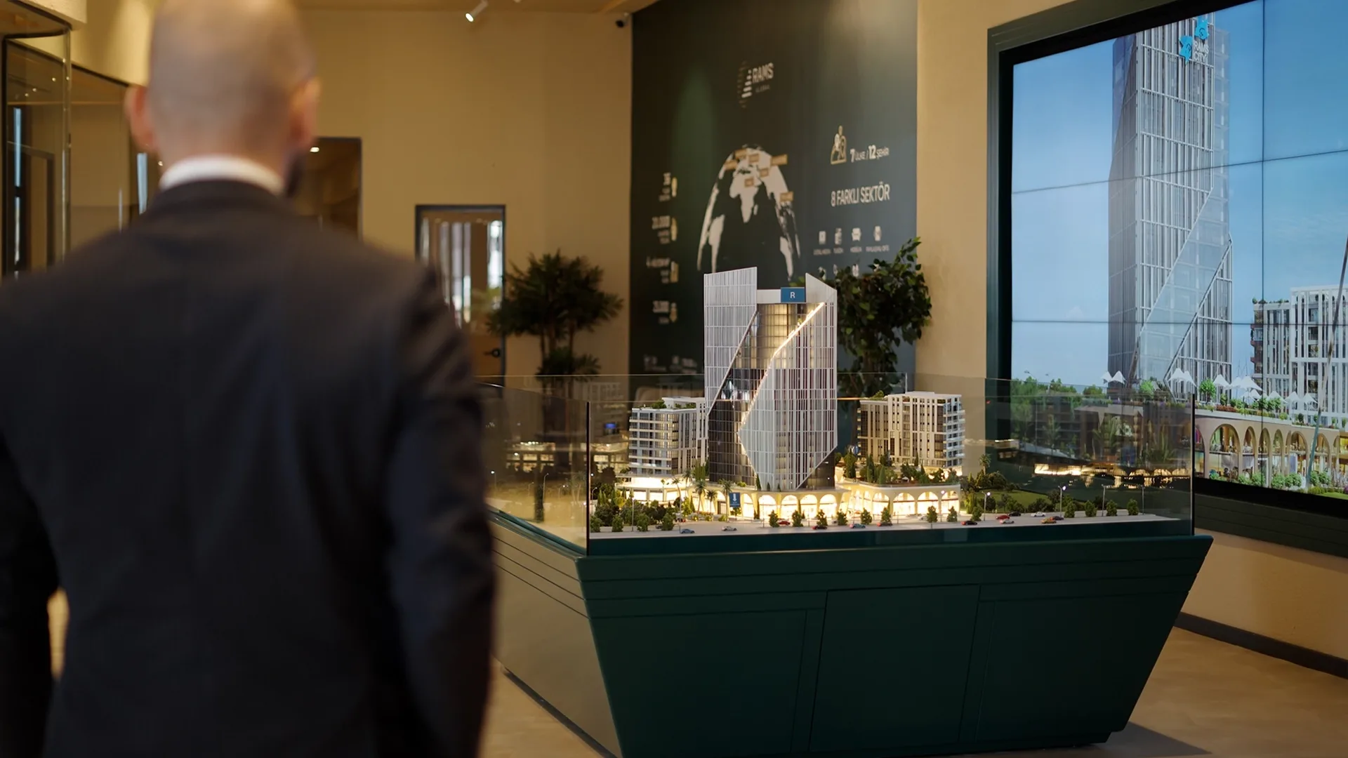 Visitor looking at the RAMS Gaziantep interactive scale model