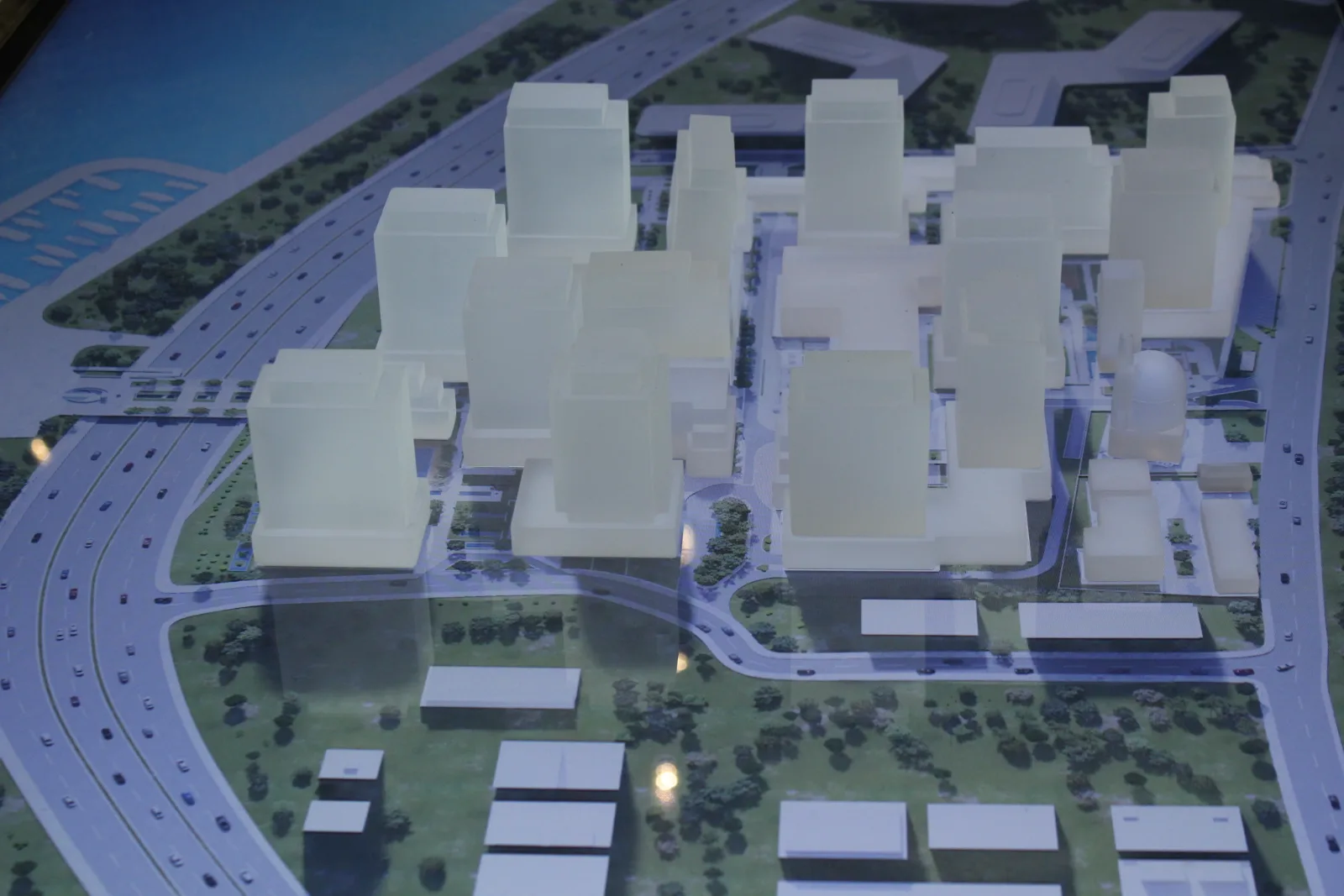 White architectural model over the projected Istanbul map