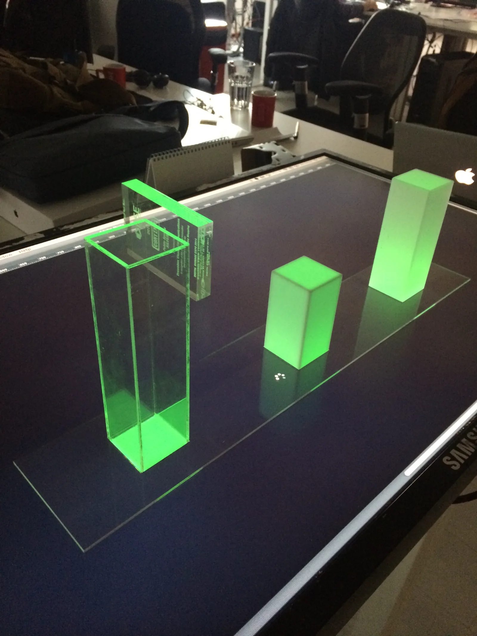 Illuminated tower prototypes on the interactive screen table